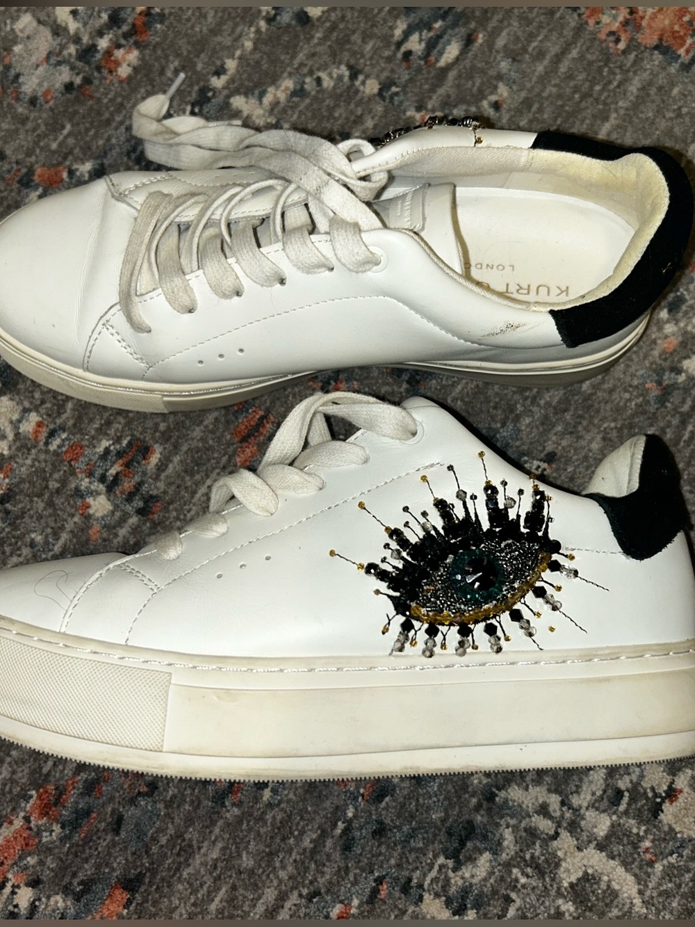 Kurt Geiger White Leather Sneakers with Black and Gold Embellished Eye